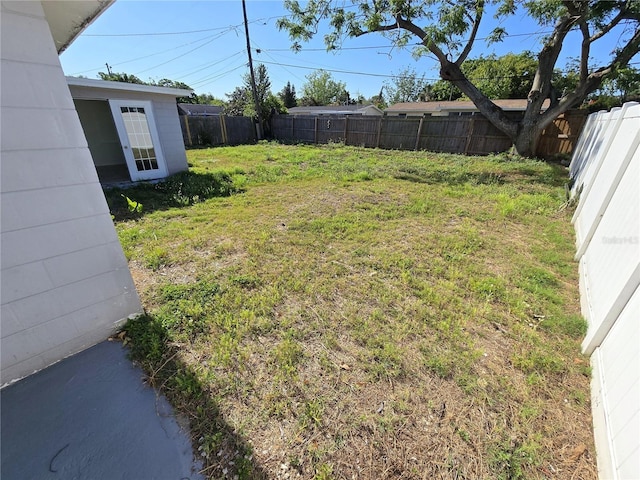 view of yard featuring a fenced backyard