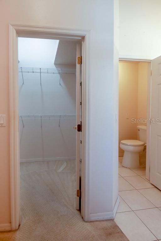 interior space with tile patterned floors