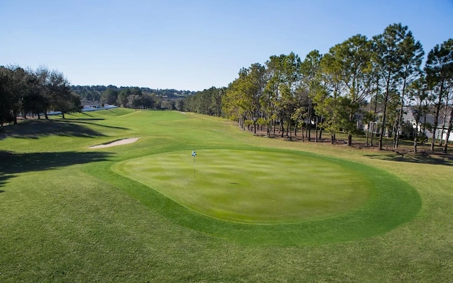 view of home's community featuring view of golf course