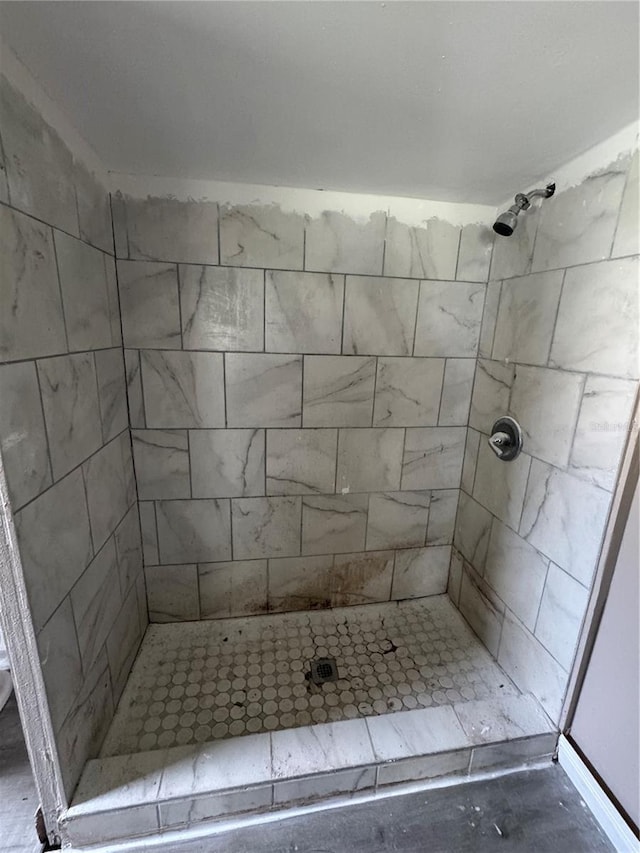 bathroom with a shower stall