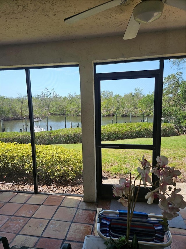 8744 54th Ave W Unit 8744, Bradenton, FL 34210 - sunroom / solarium with a water view, healthy amount of natural light, and a ceiling fan
