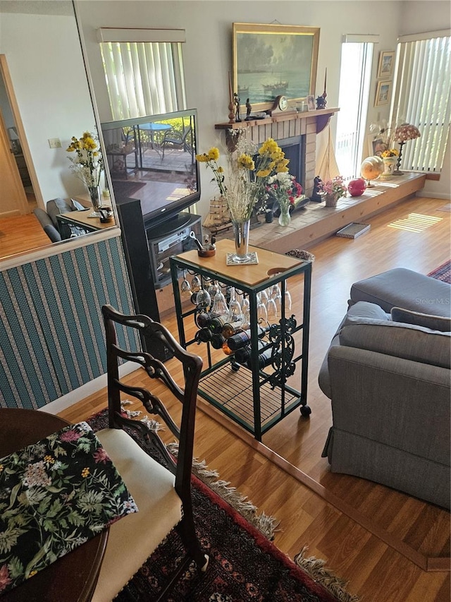 8744 54th Ave W Unit 8744, Bradenton, FL 34210 - living area featuring wood finished floors and healthy amount of natural light
