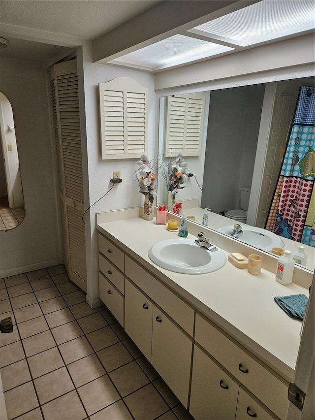 8744 54th Ave W Unit 8744, Bradenton, FL 34210 - full bathroom with vanity, tile patterned floors, and a closet