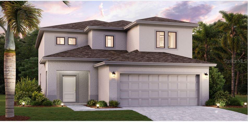 view of front of house with stucco siding, decorative driveway, a garage, and a shingled roof