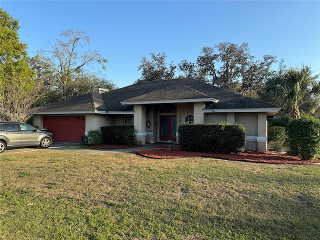 single story home with stucco siding, driveway, a shingled roof, an attached garage, and a front yard