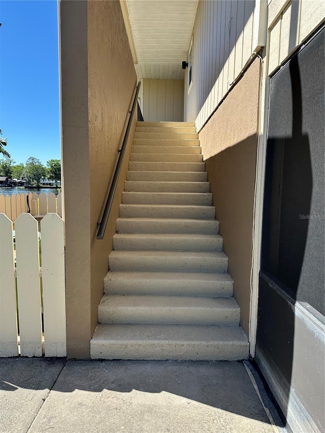 stairs with a water view