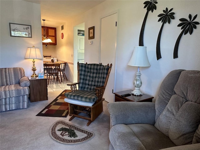 living area with carpet flooring