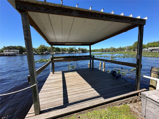 view of dock with a water view