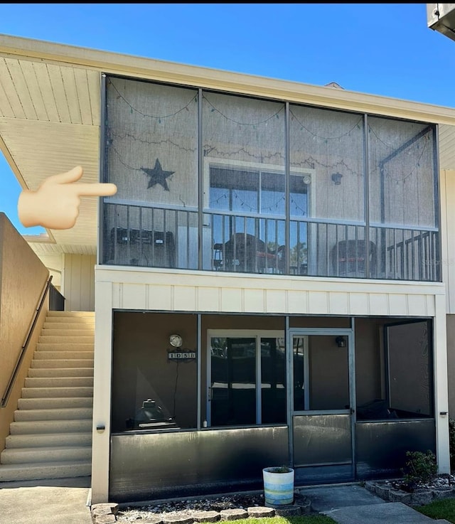 view of building exterior featuring stairs
