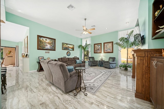365 N Spaulding Cv, Lake Mary, FL 32746 - living area with a ceiling fan and marble tiled floors