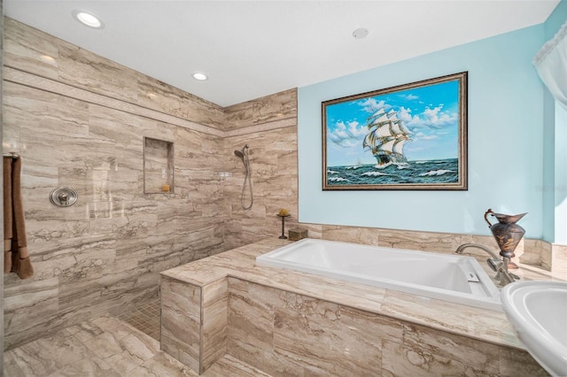 365 N Spaulding Cv, Lake Mary, FL 32746 - bathroom with a tile shower, a garden tub, and recessed lighting