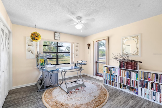 34 Misty Meadow Ln, Mulberry, FL 33860 - office space featuring ceiling fan, a textured ceiling, wood finished floors, and baseboards