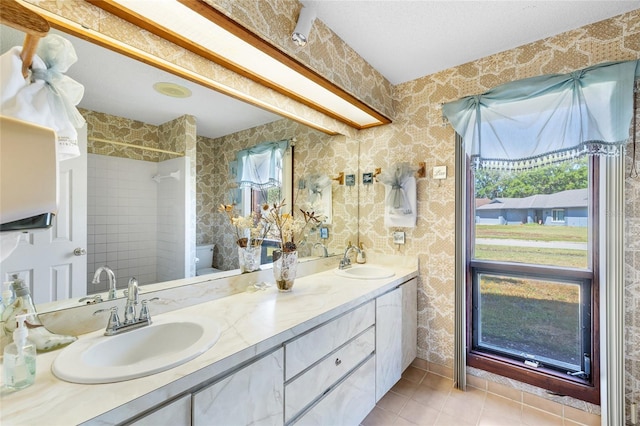 34 Misty Meadow Ln, Mulberry, FL 33860 - bathroom featuring a sink, tile patterned flooring, and a healthy amount of sunlight