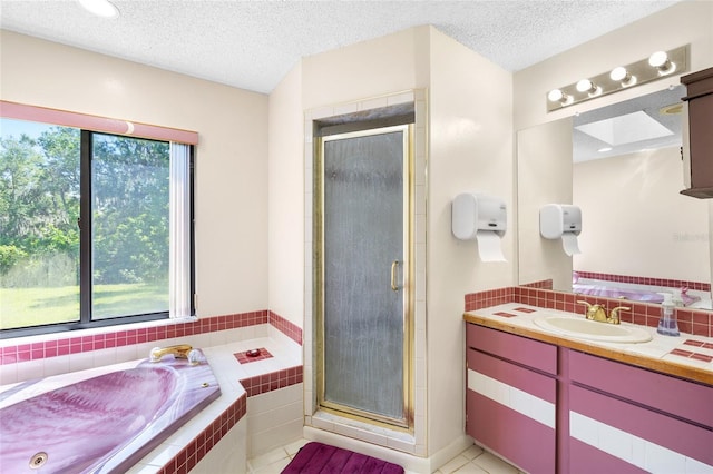 34 Misty Meadow Ln, Mulberry, FL 33860 - full bath with vanity, a bath, a stall shower, and a textured ceiling