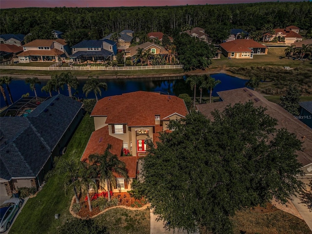 3033 Stonegate Falls Dr, Land O Lakes, FL 34638 - aerial view featuring a water view, a wooded view, and a residential view