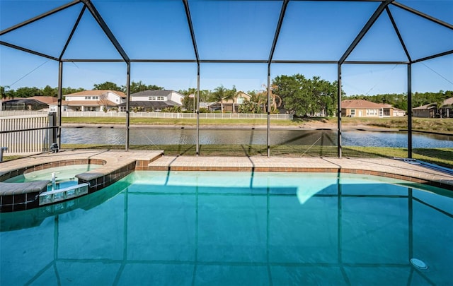 3033 Stonegate Falls Dr, Land O Lakes, FL 34638 - view of swimming pool with a water view, glass enclosure, and a residential view