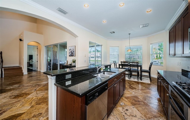 3033 Stonegate Falls Dr, Land O Lakes, FL 34638 - kitchen featuring a sink, oven, visible vents, dishwasher, and arched walkways