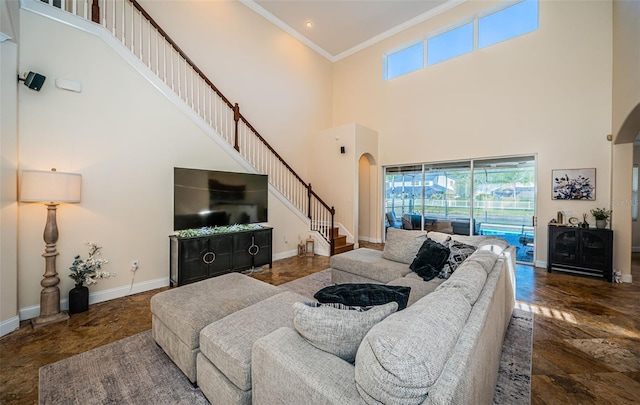 3033 Stonegate Falls Dr, Land O Lakes, FL 34638 - living area featuring arched walkways, ornamental molding, a healthy amount of sunlight, and a high ceiling