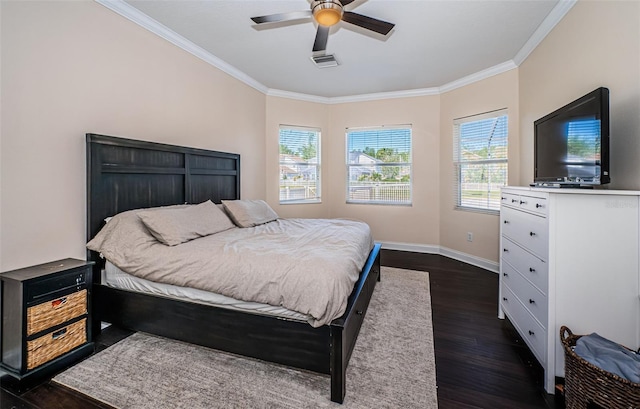3033 Stonegate Falls Dr, Land O Lakes, FL 34638 - bedroom with ornamental molding, visible vents, ceiling fan, dark wood-style floors, and baseboards