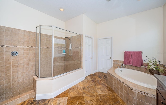 3033 Stonegate Falls Dr, Land O Lakes, FL 34638 - full bath with a tile shower, a garden tub, and recessed lighting