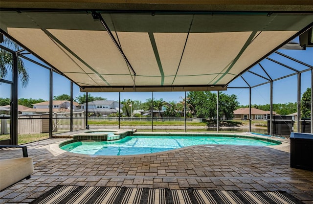 3033 Stonegate Falls Dr, Land O Lakes, FL 34638 - view of pool with a pool with connected hot tub, a lanai, and a patio