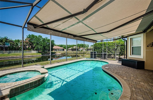 3033 Stonegate Falls Dr, Land O Lakes, FL 34638 - view of swimming pool featuring a pool with connected hot tub, a patio, a water view, and a lanai