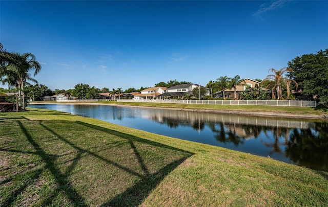 3033 Stonegate Falls Dr, Land O Lakes, FL 34638 - property view of water featuring a residential view and fence
