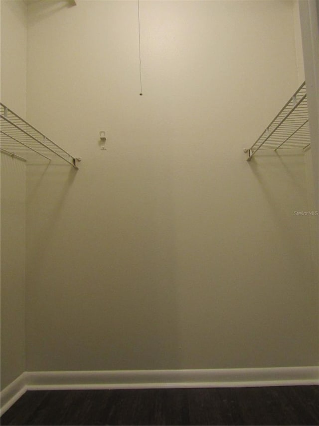 3102 W Horatio St Unit 12, Tampa, FL 33609 - spacious closet with wood finished floors