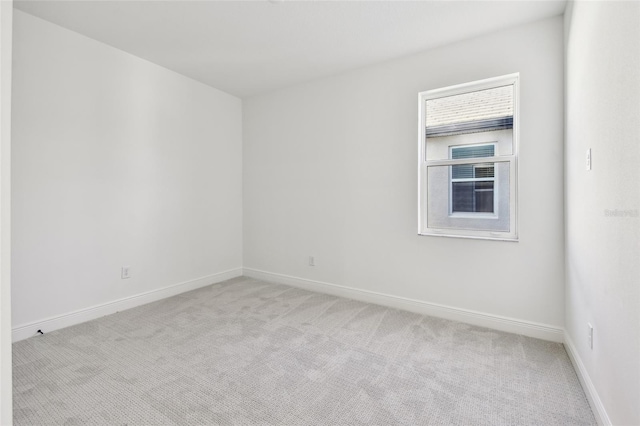 17245 Savory Mist Cir, Bradenton, FL 34211 - empty room featuring baseboards and light carpet
