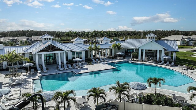 17245 Savory Mist Cir, Bradenton, FL 34211 - pool featuring a patio, fence, french doors, and a residential view