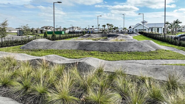 17245 Savory Mist Cir, Bradenton, FL 34211 - view of property's community featuring fence and a residential view