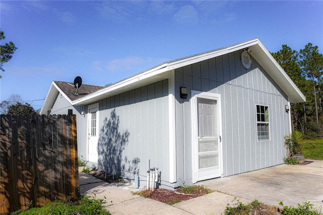 3426 Somerset Ave, Deltona, FL 32738 - view of home's exterior featuring fence and a patio area