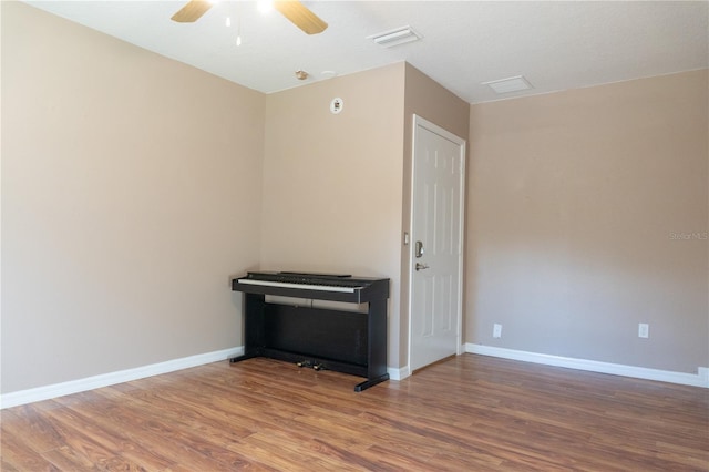 3426 Somerset Ave, Deltona, FL 32738 - spare room featuring wood finished floors, visible vents, baseboards, and ceiling fan