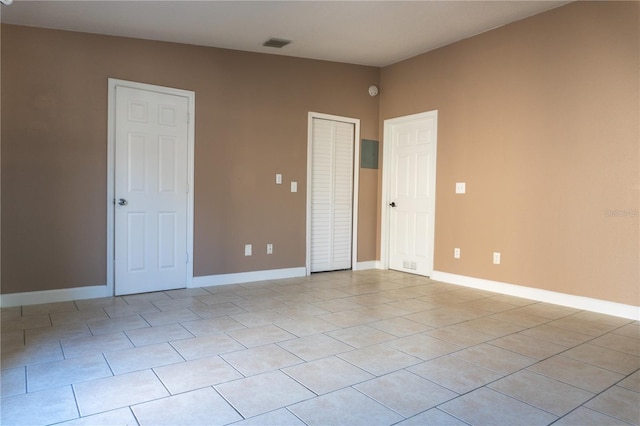 3426 Somerset Ave, Deltona, FL 32738 - interior space with baseboards, light tile patterned flooring, and visible vents