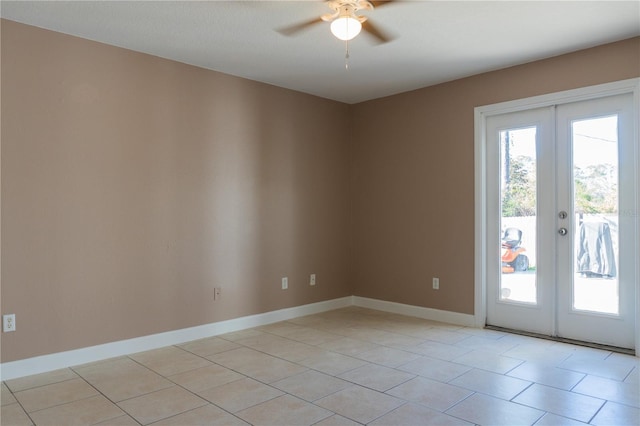 3426 Somerset Ave, Deltona, FL 32738 - spare room with baseboards, light tile patterned floors, ceiling fan, and french doors