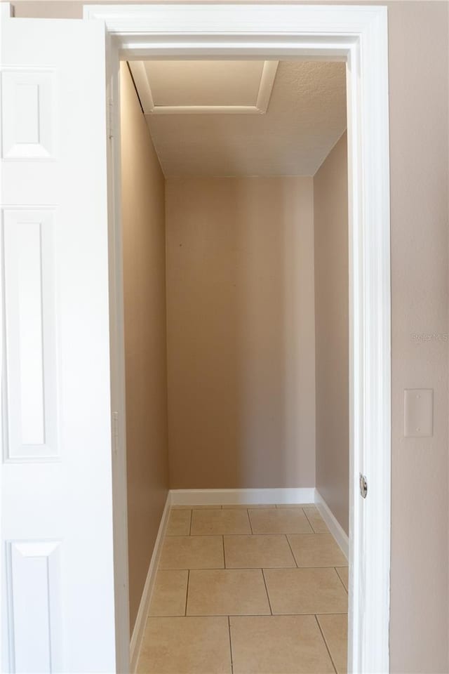 3426 Somerset Ave, Deltona, FL 32738 - interior space featuring attic access and light tile patterned floors