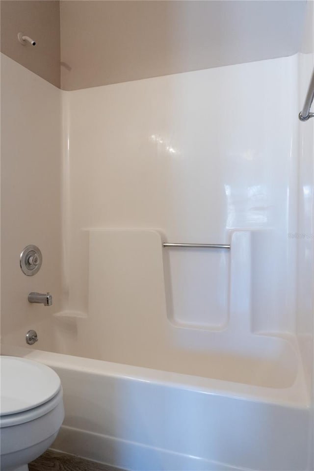 3426 Somerset Ave, Deltona, FL 32738 - full bath featuring toilet and bathing tub / shower combination