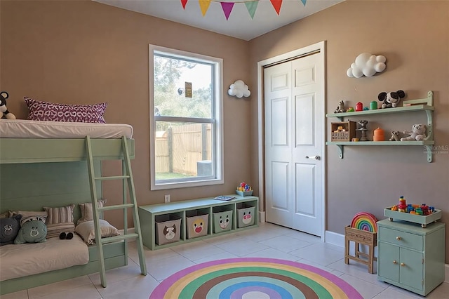 3426 Somerset Ave, Deltona, FL 32738 - recreation room with baseboards and light tile patterned floors
