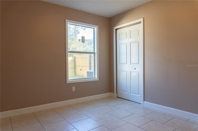 3426 Somerset Ave, Deltona, FL 32738 - interior space featuring baseboards, a closet, and light tile patterned floors
