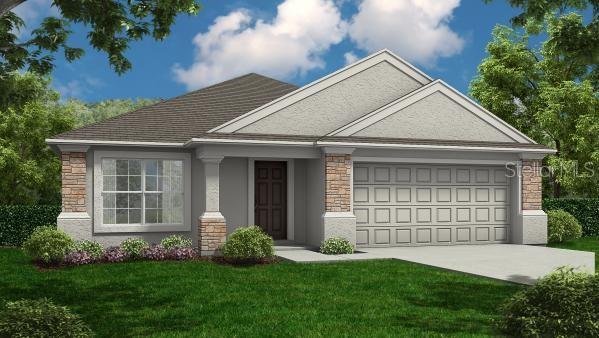 view of front facade with concrete driveway, an attached garage, stone siding, and a front yard