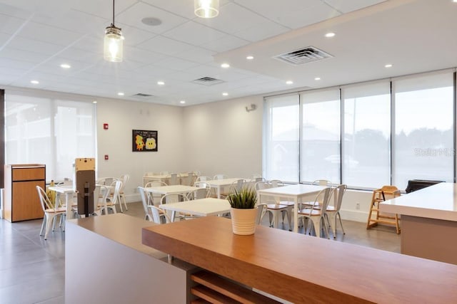5245 W Irlo Bronson Memorial Hwy Unit 113, Kissimmee, FL 34746 - dining space featuring recessed lighting, a paneled ceiling, and visible vents