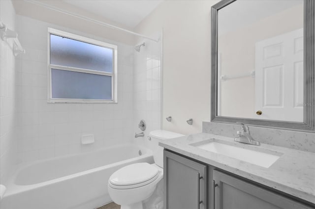 full bath with vanity, toilet, and bathtub / shower combination