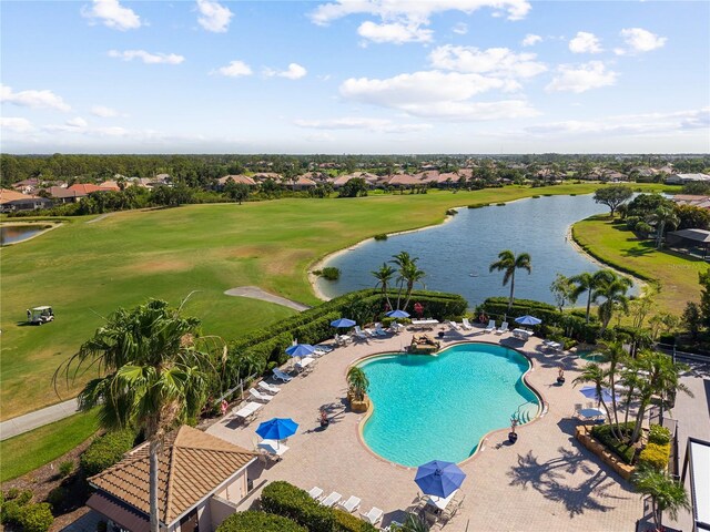 bird's eye view with a water view, view of golf course, and a residential view