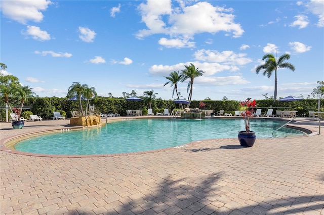 pool with a patio area