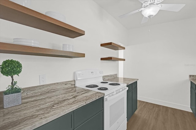 kitchen featuring a ceiling fan, open shelves, wood finished floors, baseboards, and white range with electric stovetop