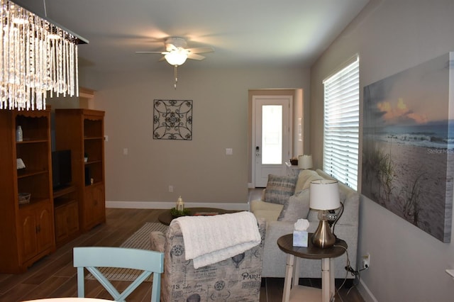 2735 Lavandula Ct, North Port, FL 34289 - living area featuring baseboards, ceiling fan, and wood finished floors