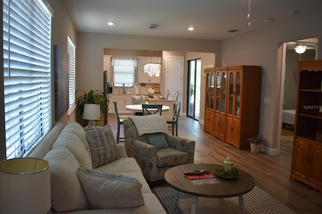 2735 Lavandula Ct, North Port, FL 34289 - living area featuring recessed lighting, a ceiling fan, light wood finished floors, and visible vents