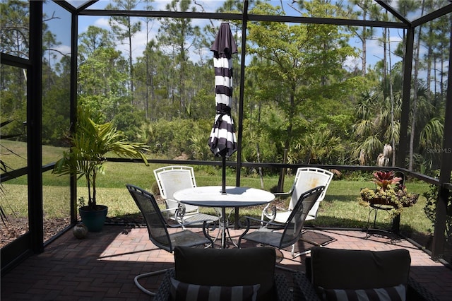 2735 Lavandula Ct, North Port, FL 34289 - sunroom / solarium with outdoor dining area