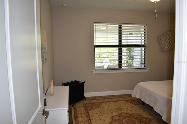 2735 Lavandula Ct, North Port, FL 34289 - bedroom with baseboards and wood finished floors