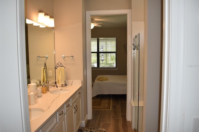 2735 Lavandula Ct, North Port, FL 34289 - ensuite bathroom with a sink, a ceiling fan, double vanity, and connected bathroom